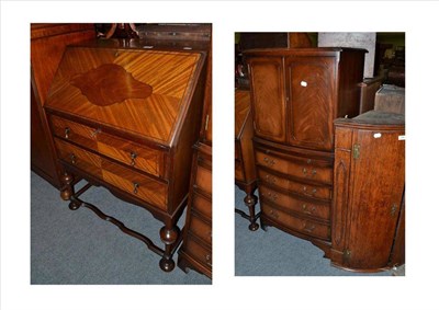 Lot 597 - A reproduction mahogany cocktail cabinet and a mahogany bureau