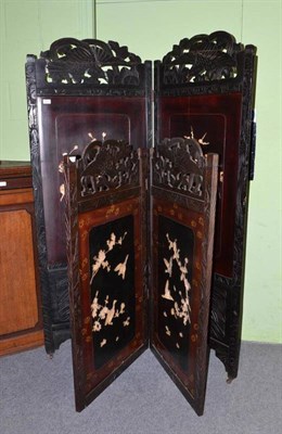 Lot 612 - Two Japanese bone inlaid lacquer and ebonised wood two leaf screens