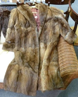 Lot 656 - A mink stole, a ermine collar, two fur coats and a wool coat with fur collar (5)