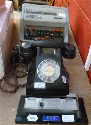 Lot 715 - An adding machine and a Bakelite telephone etc