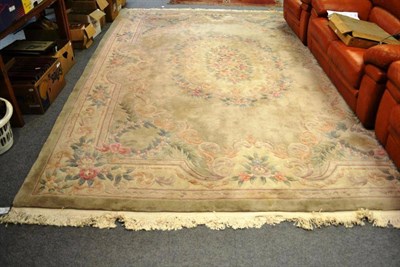 Lot 746 - A Chinese cream ground floral rug