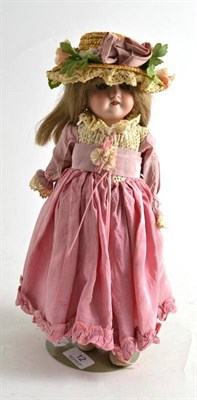 Lot 12 - A 19th century bisque head doll, stamped DEP R4A, maker Theodor Recknagel of Oeslea, Thuringia