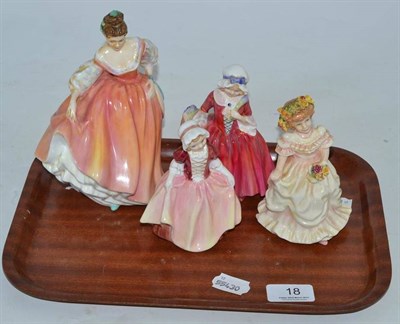 Lot 18 - Four Royal Doulton figures; Bridesmaid, Lavinia, Fair Lady (coral pink) and Dinky Do