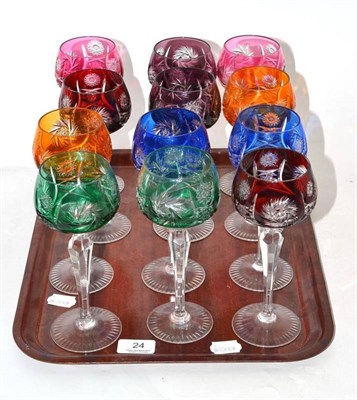 Lot 24 - Set of twelve cut glass coloured hock glasses