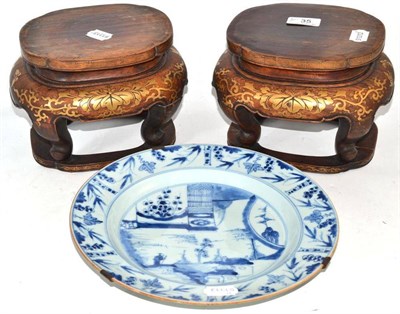 Lot 35 - Pair of Chinese hardwood stands with gilt painted decoration and an 18th century Chinese blue...