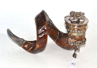 Lot 38 - A ram's horn snuff mull with silver plated mounts