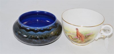 Lot 40 - Royal Worcester large mug painted with a grouse and a Lancastrian pottery bowl (2)