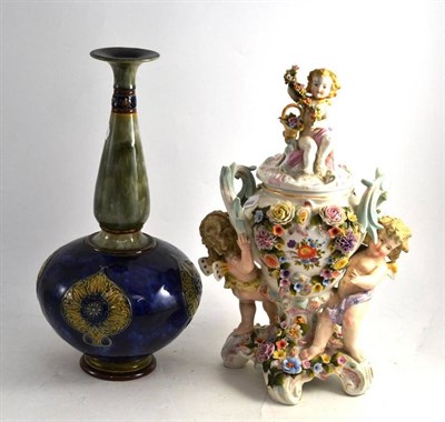 Lot 47 - A Royal Doulton stoneware vase and a Sitzendorf porcelain floral encrusted vase (2)