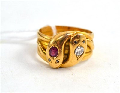 Lot 57 - Snake head ring set with diamond and ruby in 18ct gold