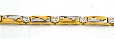 Lot 58 - A cubic zirconia set bracelet, stamped '750'