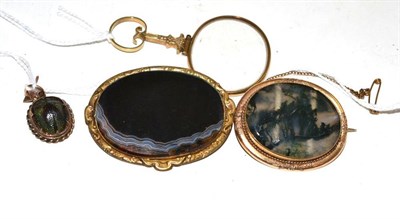 Lot 67 - Agate brooch, moss agate brooch, eye glass and a scarab beetle pendant