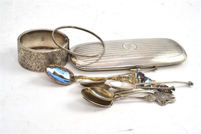 Lot 70 - Silver spectacle case, bangle teaspoons, etc