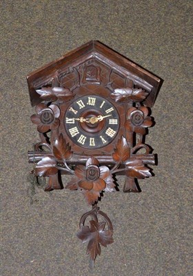 Lot 98 - A cuckoo wall clock
