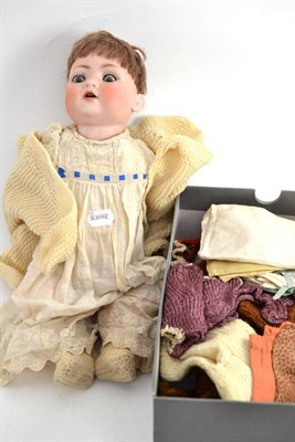 Lot 110 - Bisque socket head doll with sleeping blue eyes and open mouth, on a bent limb composition...