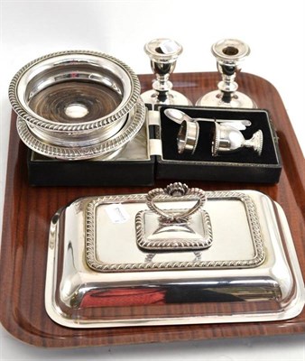 Lot 117 - Silver cased egg cup and spoon, two plated wine coasters, pair of plated candlesticks and...