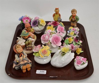 Lot 144 - Five Hummel figurines and nine Staffordshire encrusted flower ornaments