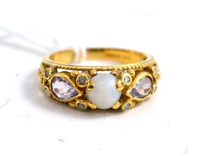 Lot 175 - An 18ct gold opal, amethyst and diamond ring