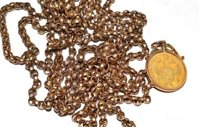 Lot 194 - A gold mounted coin and muff chain
