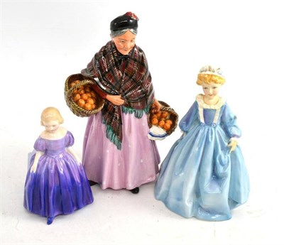 Lot 209 - Royal Doulton 'Orange Lady' HN1759, Doulton 'Marie' and a Worcester figure 'Grandmother's Dress'