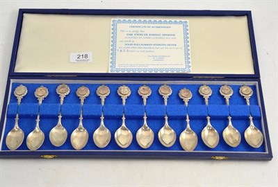 Lot 218 - A cased set of twelve silver teaspoons