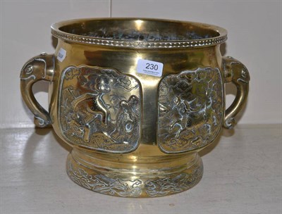 Lot 230 - A 19th century Chinese brass jardiniere cast with panels of animals