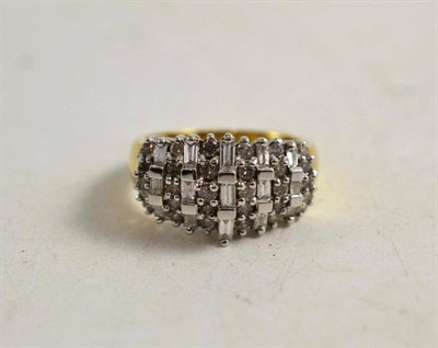 Lot 259 - An 18ct gold half hoop ring, pave set with baguette and brilliant cut diamonds
