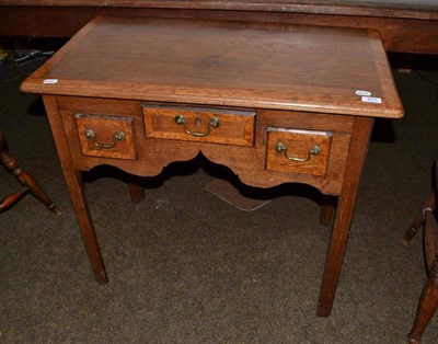 Lot 677 - 19th Century oak lowboy