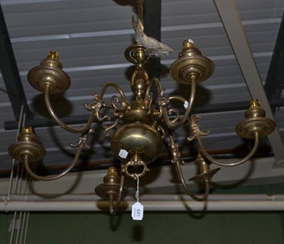 Lot 681 - A brass chandelier, decorated with a double-headed eagle