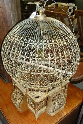 Lot 712 - A decorative gold plated wire and wooden bird cage and a modern standard lamp