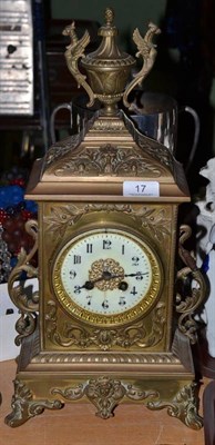 Lot 17 - A gilt metal striking mantel clock