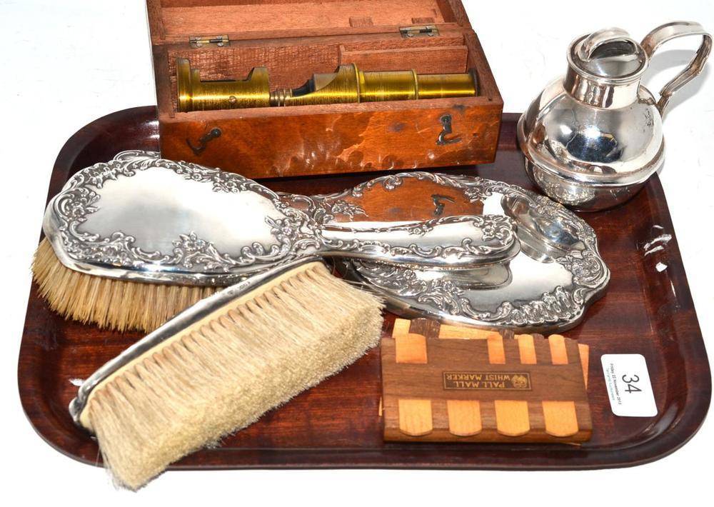 Lot 34 - Three piece silver dressing table set; silver Guernsey can and box including two whist markers; and