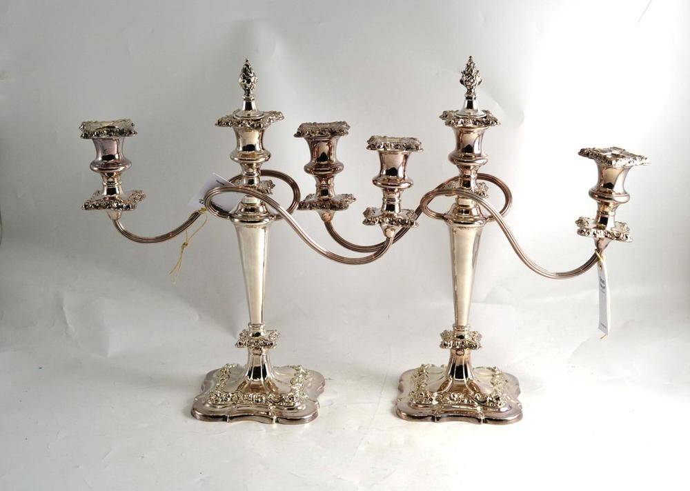 Lot 41 - A pair of electroplate candelabra