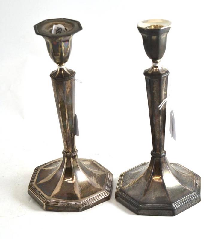 Lot 59 - An pair of William IV loaded candlesticks 1833 (one sconce missing)