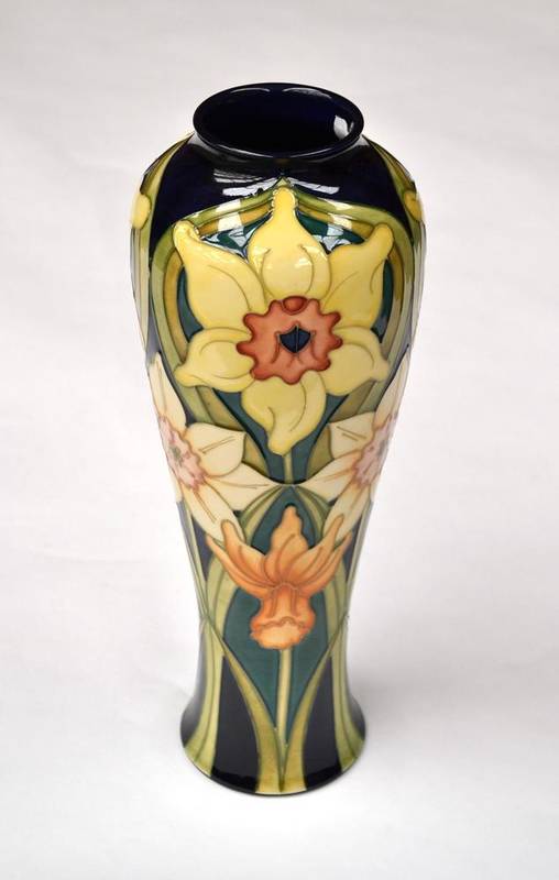 Lot 614 - A Modern Moorcroft Daffodil Pattern Vase, designed by Rachel Bishop, on a green and blue...