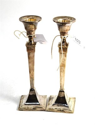 Lot 103 - A pair of loaded silver candlesticks (a.f.)