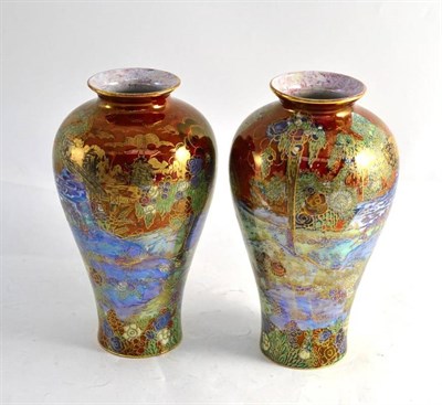 Lot 107 - Pair of Wilton ware lustre bottle vases