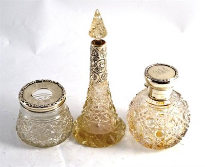 Lot 110 - Two silver topped scent bottles and a hair tidy