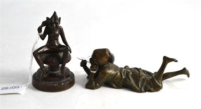 Lot 113 - A small bronze figure of a reclining Arab boy, possibly Bergman and a bronze figure of a...