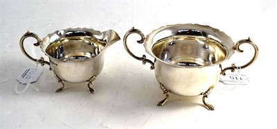 Lot 115 - A silver sugar bowl and cream jug