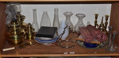 Lot 119 - Three oil lamps with shades, pair of silver loaded candlesticks, table lamp and shade etc (on...