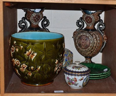 Lot 121 - A pair of Continental earthenware ewers, a Majolica jardiniere, three green pottery leaf...