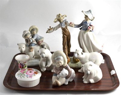 Lot 146 - Six pieces of Lladro, Royal Crown Derby miniature vase and a Wedgwood jar and cover