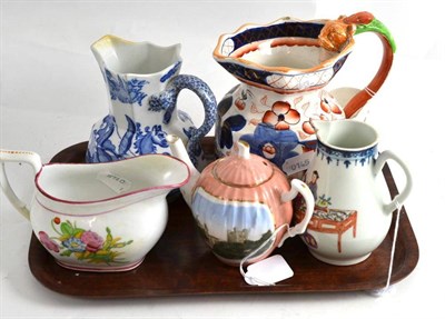 Lot 165 - A sparrow beak jug, a Newhall jug, two ironstone jugs and a German teapot