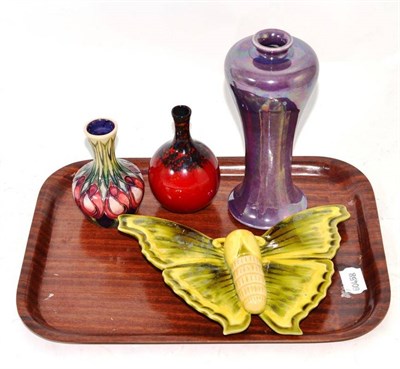 Lot 178 - A Ruskin vase with lavender glaze, a modern Moorcroft vase (silver line), a Linthorpe butterfly...