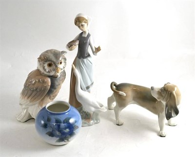 Lot 180 - Lladro goose girl, Lladro Dachshund and two other pieces
