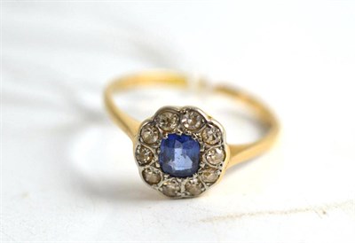 Lot 205 - A sapphire and diamond ring