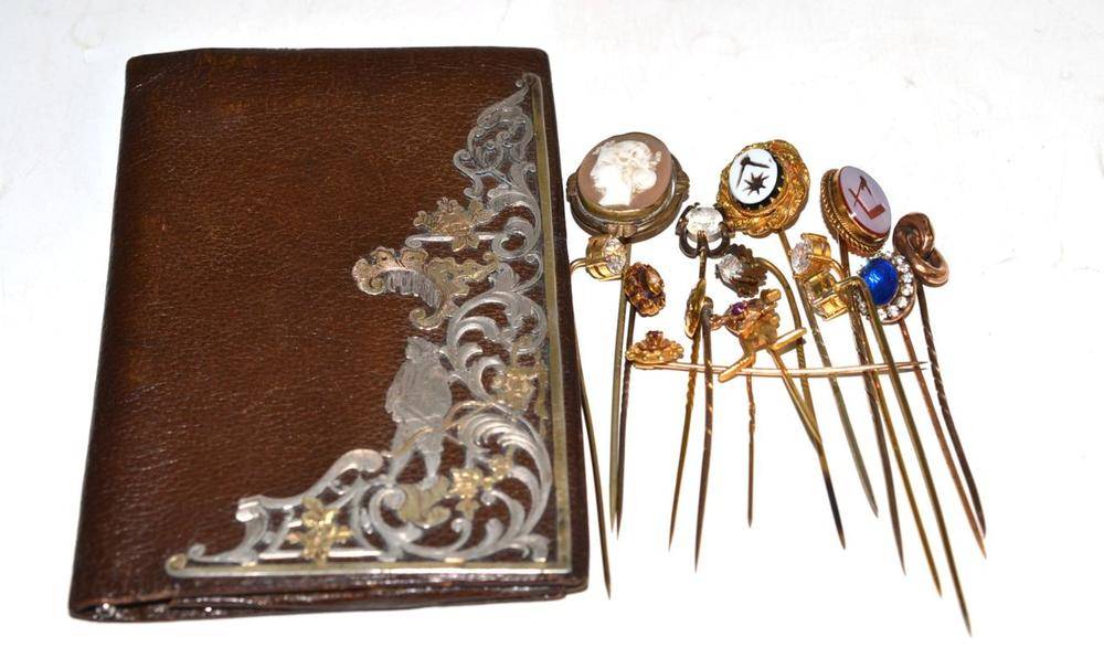 Lot 210 - Two stick pins stamped '15CT', other costume stick pins and a small brown leather wallet...
