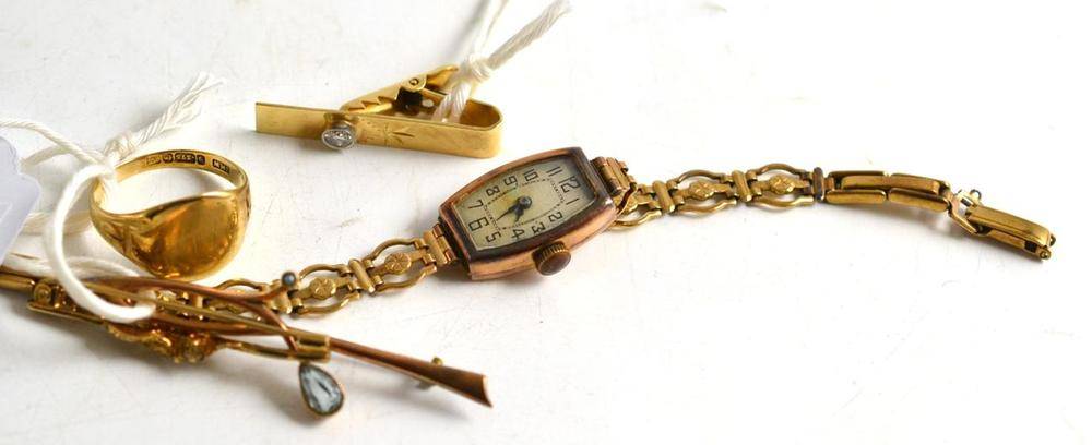 Lot 215 - A 9ct gold lady's wristwatch, 9ct gold signet ring, two bar brooches and a stone set tie pin...