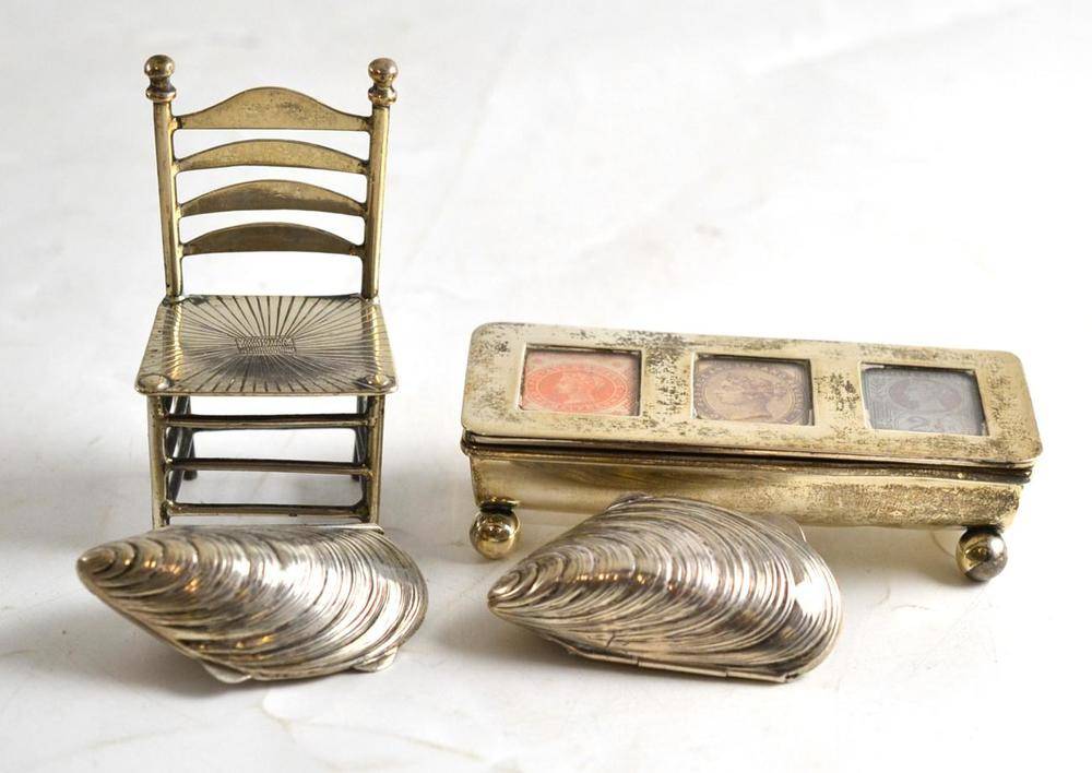 Lot 228 - A silver three division stamp case, two hinged shells and a miniature chair