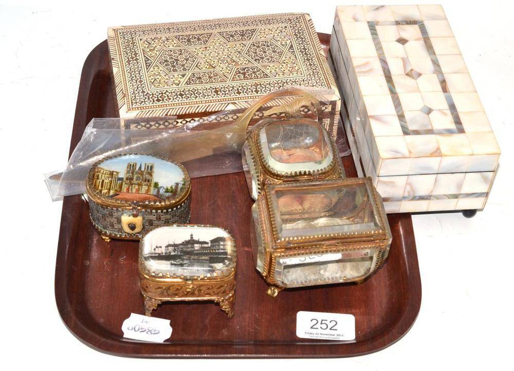 Lot 252 - Gilt metal jewellery boxes, mother-of-pearl brooches and an Indian box